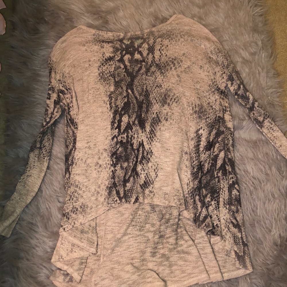 High low snake skin sweater.
